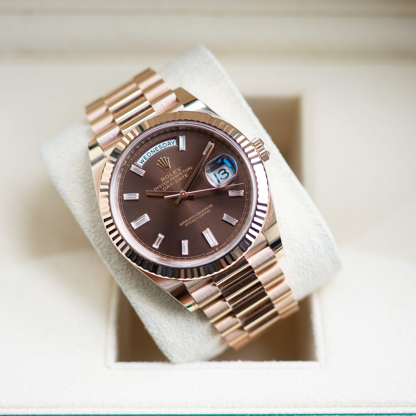 Rolex Day-Date 40mm 228235 Rose Gold Chocolate Baguette Dial Stainless Steel Chain Men’s Watch